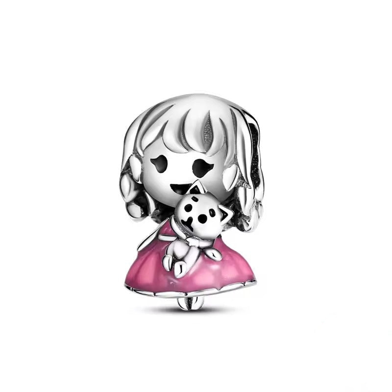 Girl Holding Puppy Charm