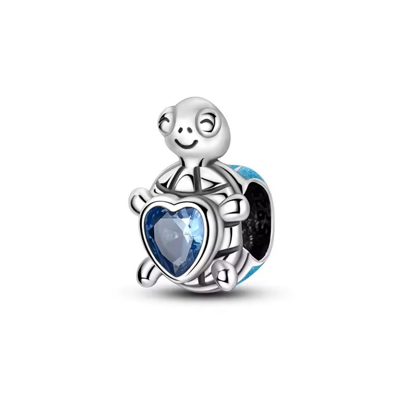 Turtle with Blue Heart Charm