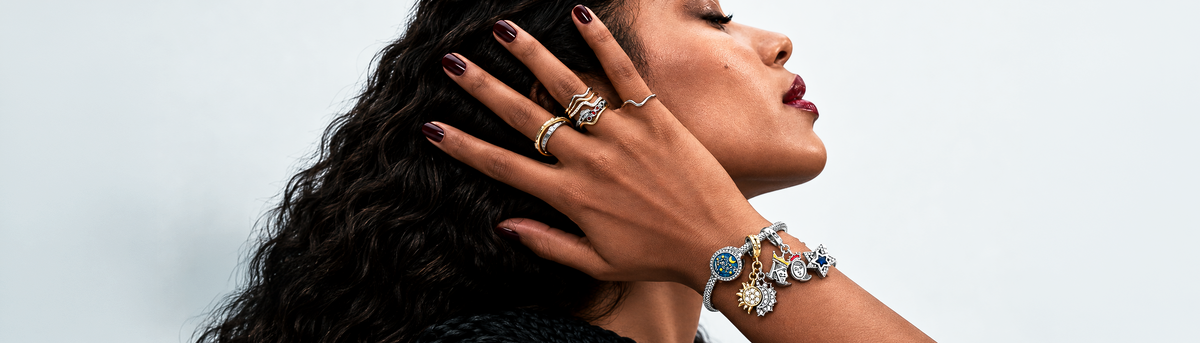 Charm bracelet with celestial charms